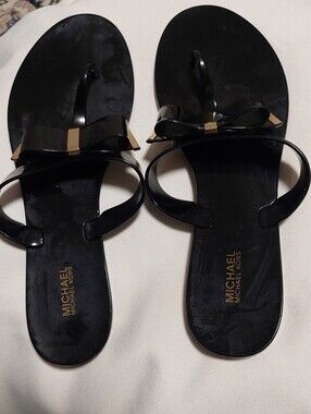 Michael Kors Black Patent Bow Jelly Sandals with Gold Accent